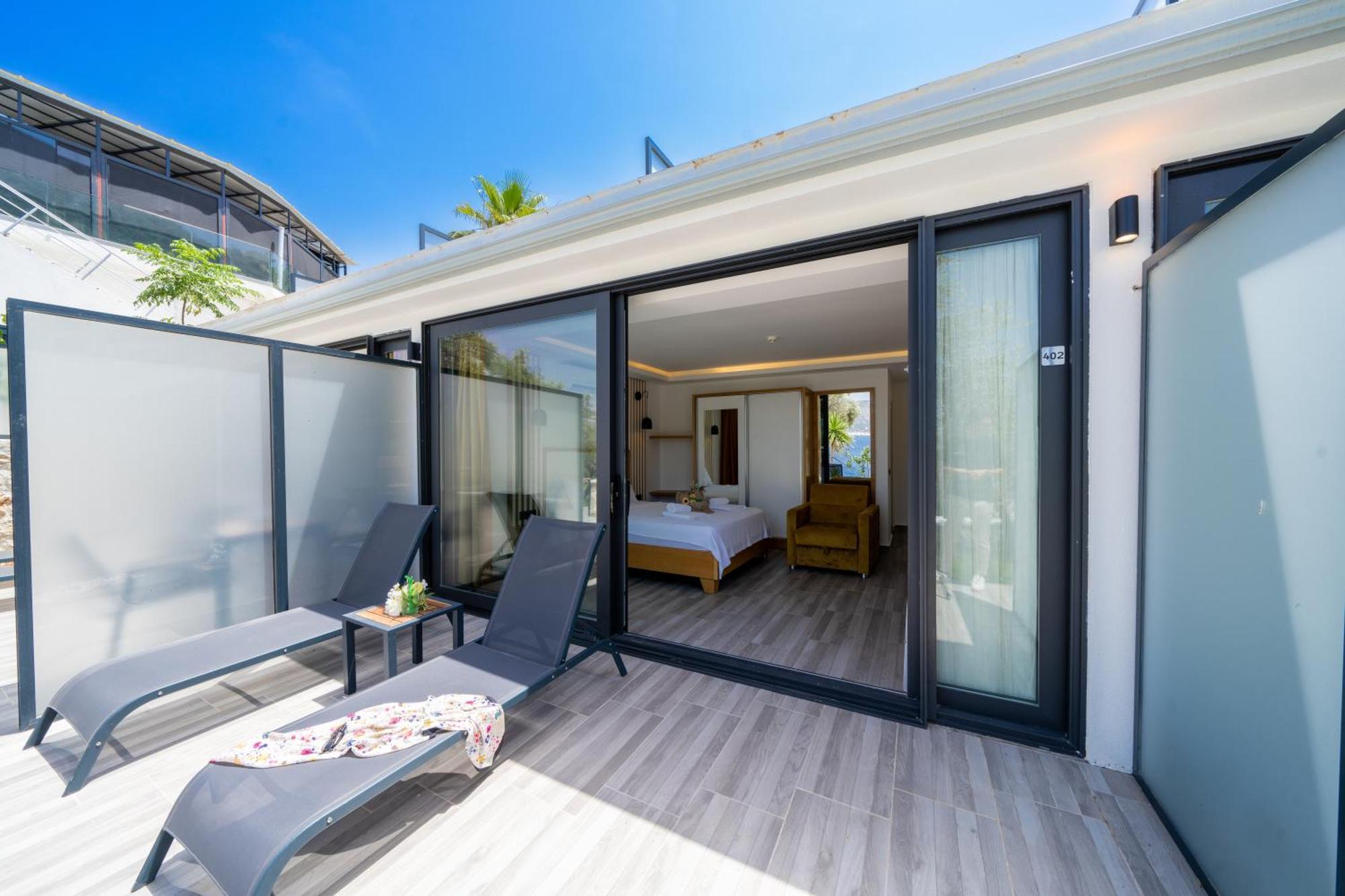 Kalkan Beach Park Hotel Каш Экстерьер фото
